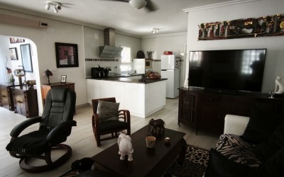 A fully renovated corner bungalow with a large garden.